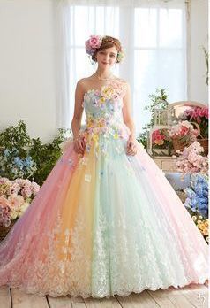 a woman in a rainbow dress